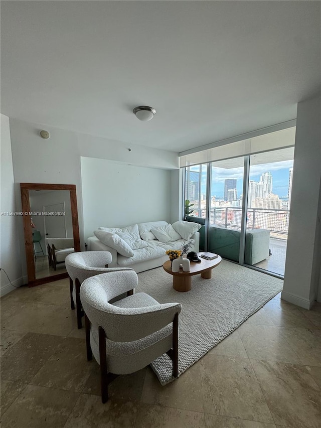 tiled living room featuring expansive windows