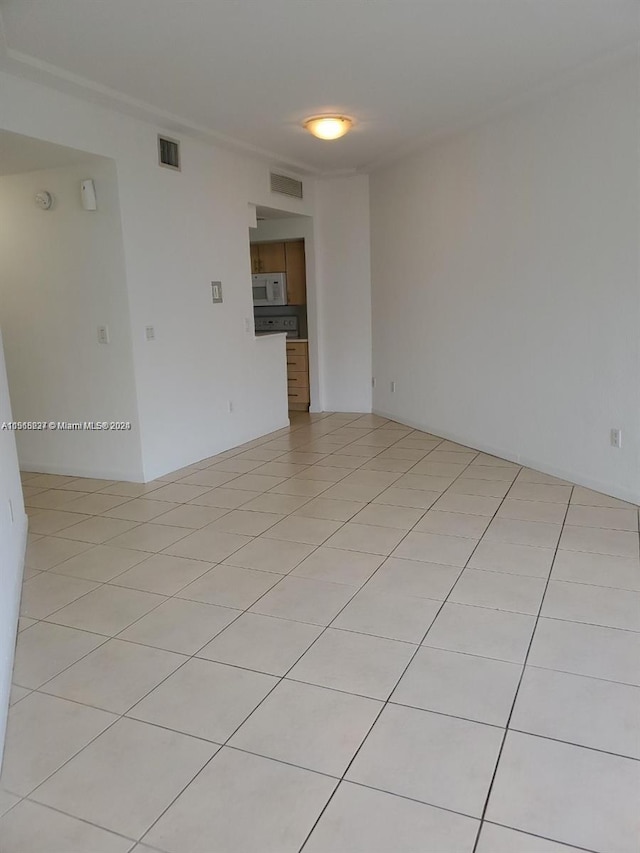 view of tiled spare room