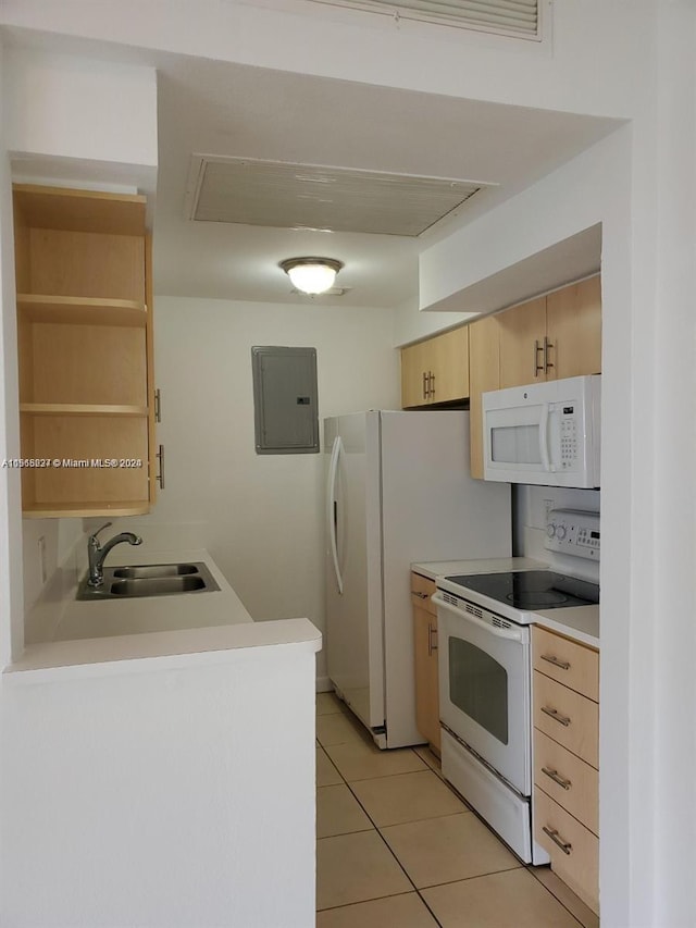 kitchen with light tile floors, light brown cabinets, white appliances, and sink