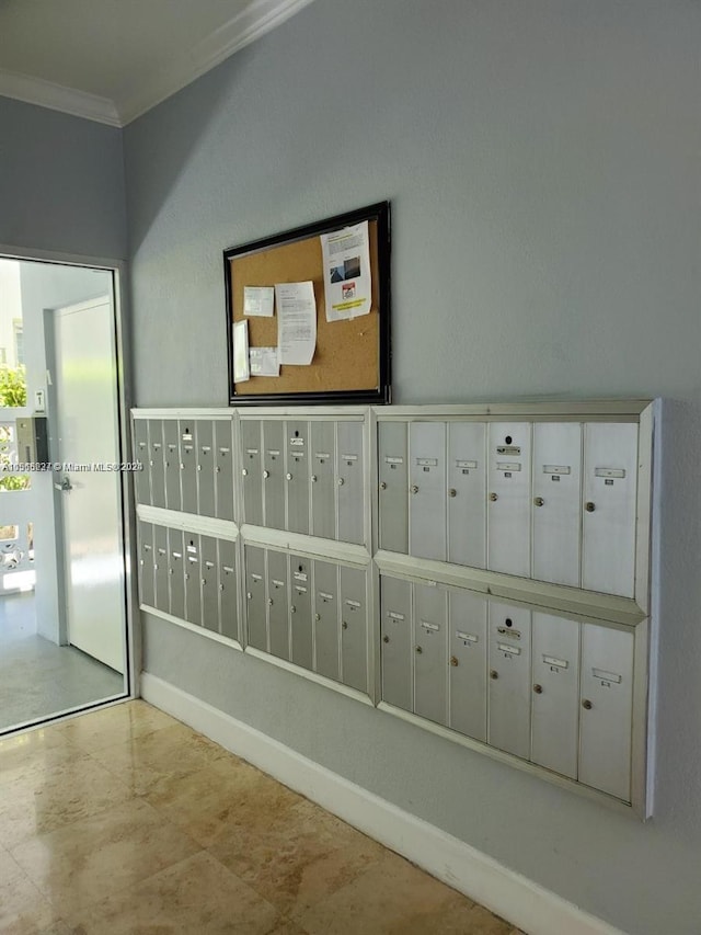 interior space featuring crown molding, light tile floors, and mail boxes