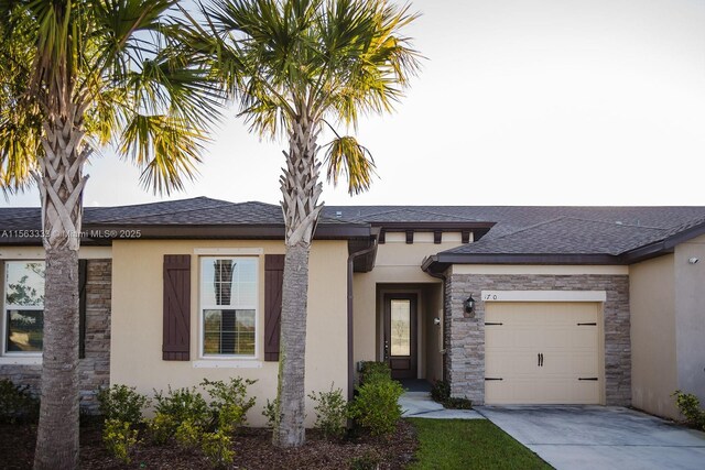 view of front of home with a garage