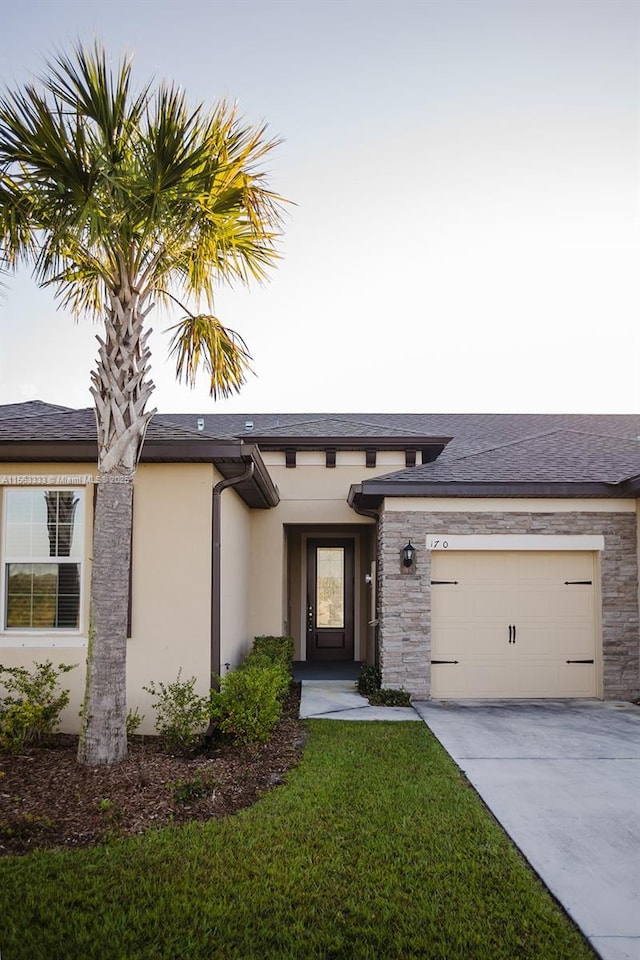 view of front of property featuring a garage