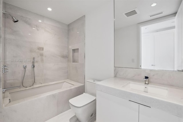 bathroom with toilet, vanity, visible vents, and a combined bath / shower with marble appearance