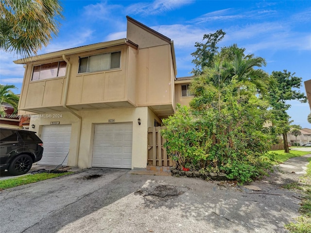 view of front of property featuring a garage