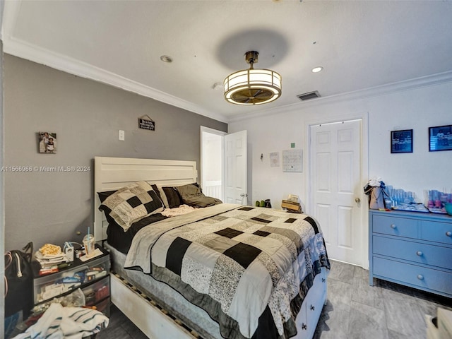 bedroom featuring crown molding