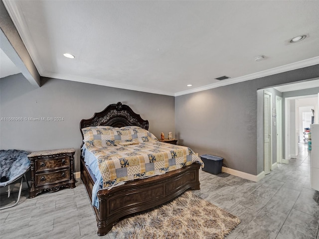 bedroom with ornamental molding