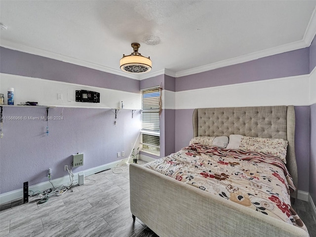 bedroom with crown molding