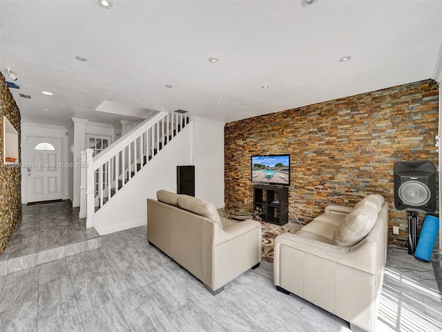 unfurnished living room featuring light tile floors