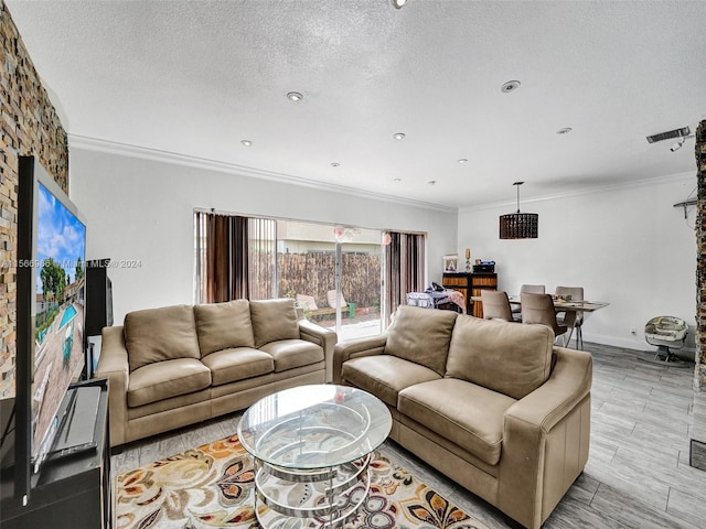 living room with a textured ceiling