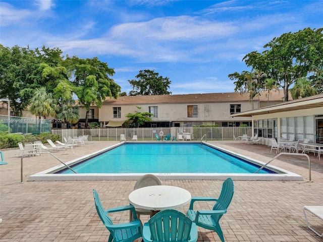 view of pool featuring a patio area