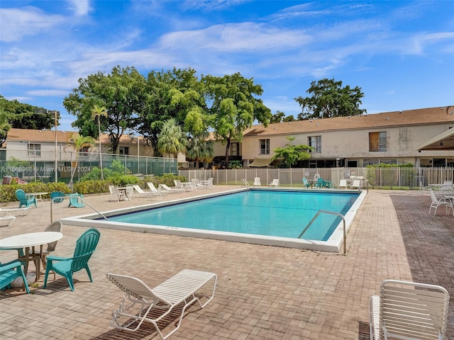 view of pool featuring a patio area