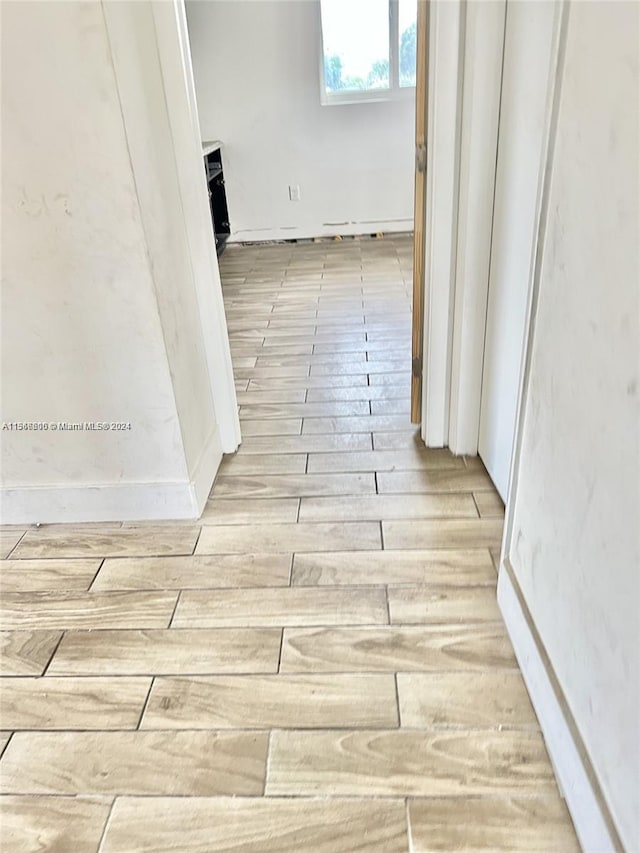 hallway featuring light hardwood / wood-style flooring