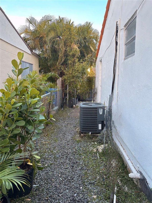 view of yard with central air condition unit