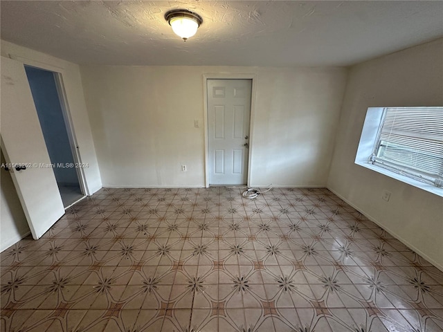 view of tiled empty room