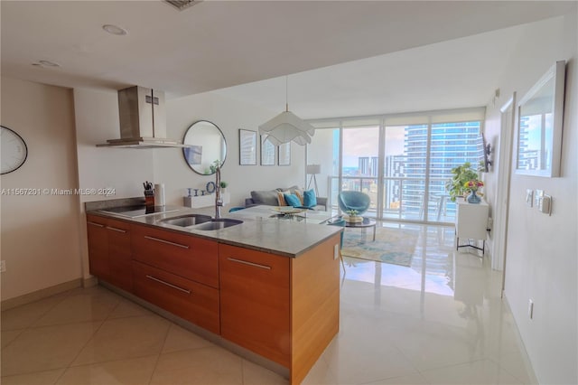 kitchen featuring extractor fan, sink, light tile patterned floors, black electric cooktop, and stone countertops