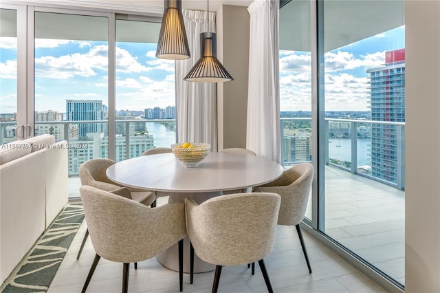 dining space with a water view