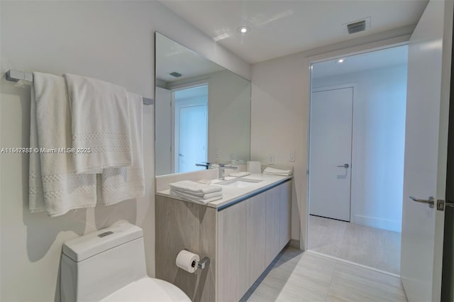4010 S Ocean Dr Unit R3308, Hollywood, FL 33019 - bathroom with toilet, vanity, and visible vents