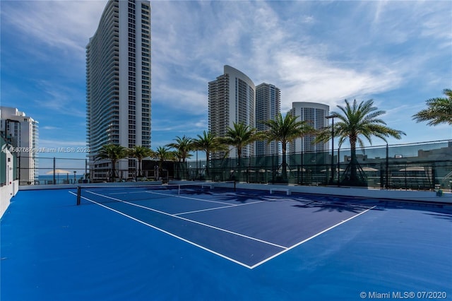 4010 S Ocean Dr Unit R3308, Hollywood, FL 33019 - view of tennis court with a city view and fence