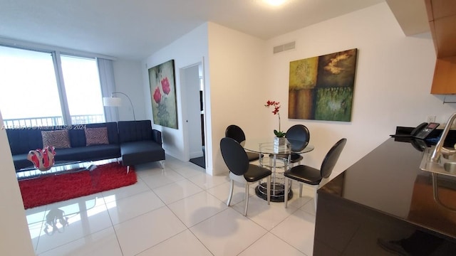 office space featuring light tile flooring