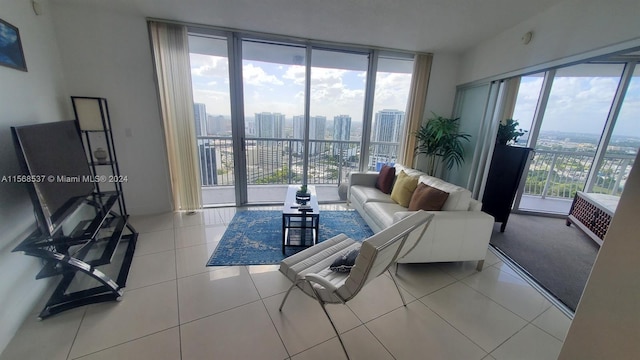 tiled living room featuring expansive windows