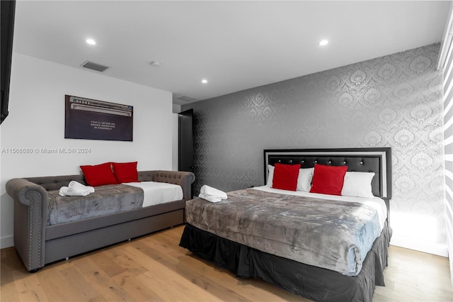 bedroom featuring light wood-type flooring