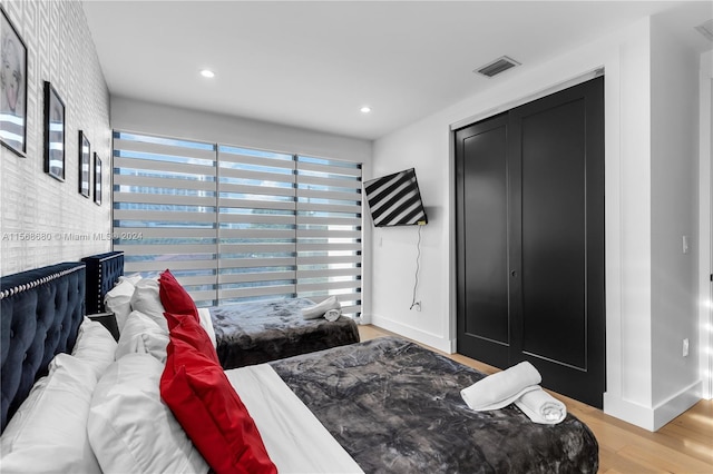 bedroom featuring light hardwood / wood-style flooring