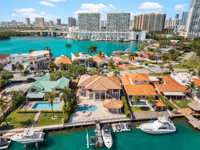 drone / aerial view featuring a water view