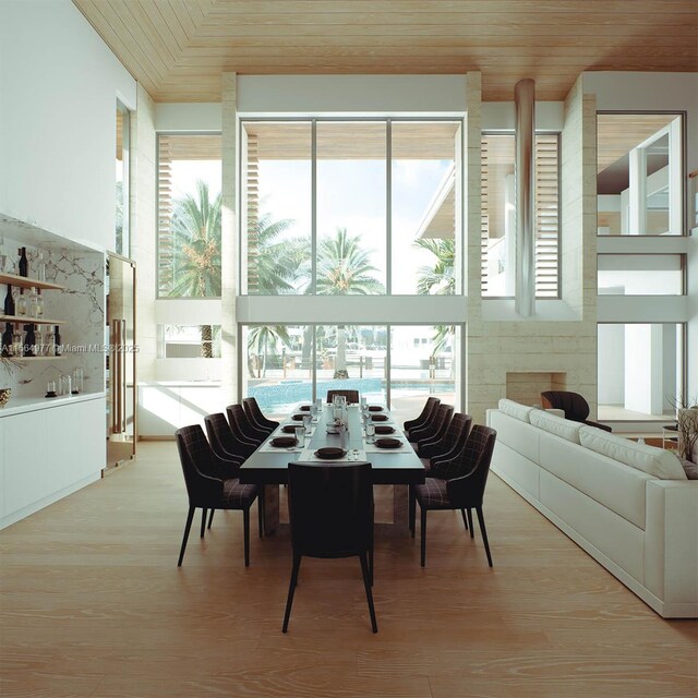 sunroom / solarium featuring wooden ceiling