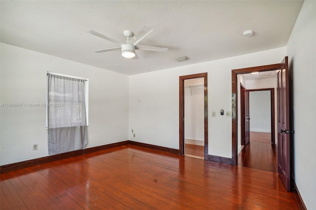 spare room featuring ceiling fan and hardwood / wood-style floors