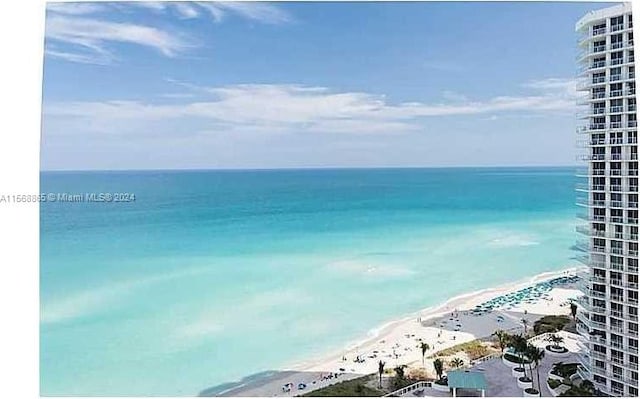 view of water feature with a beach view