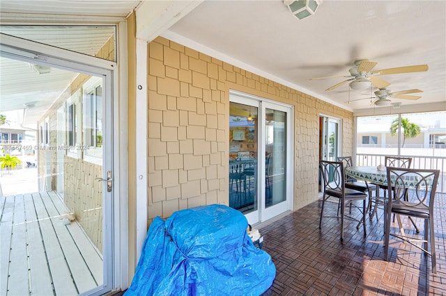 exterior space with ceiling fan