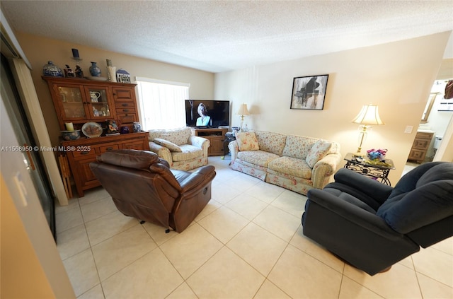 tiled living room with a textured ceiling