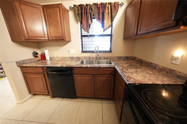 kitchen featuring black dishwasher, electric range oven, sink, and light tile flooring