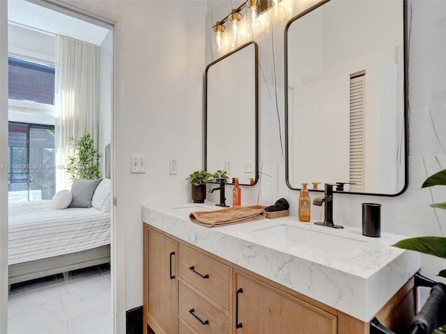 bathroom featuring tile flooring and vanity with extensive cabinet space