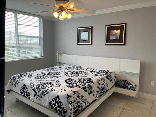 bedroom featuring light tile flooring, ceiling fan, crown molding, and a textured ceiling