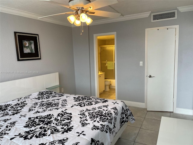 bedroom featuring crown molding, ceiling fan, light tile floors, and ensuite bathroom