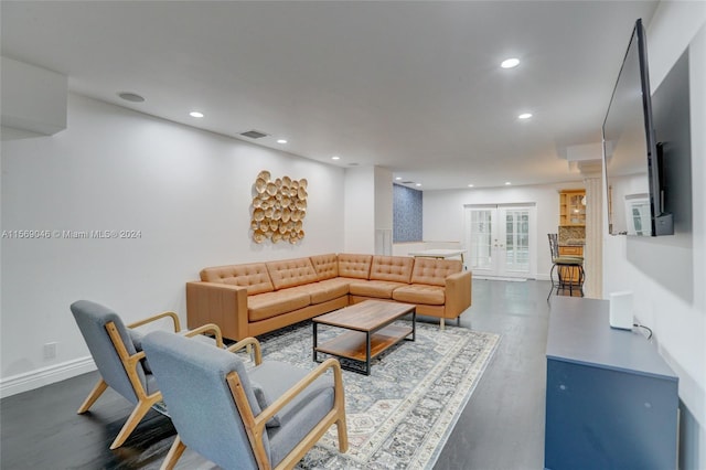 living room with wood-type flooring and french doors