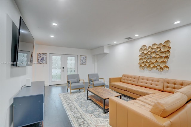 living room with french doors and wood-type flooring