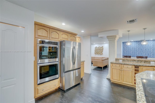 kitchen featuring light brown cabinetry, stainless steel appliances, hanging light fixtures, light stone counters, and ornate columns