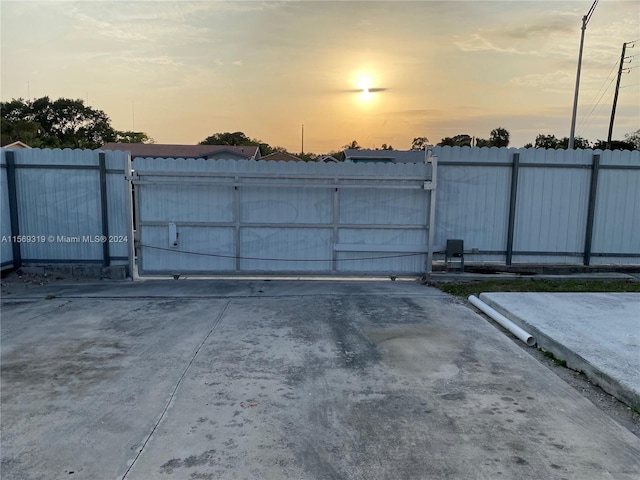 view of gate at dusk