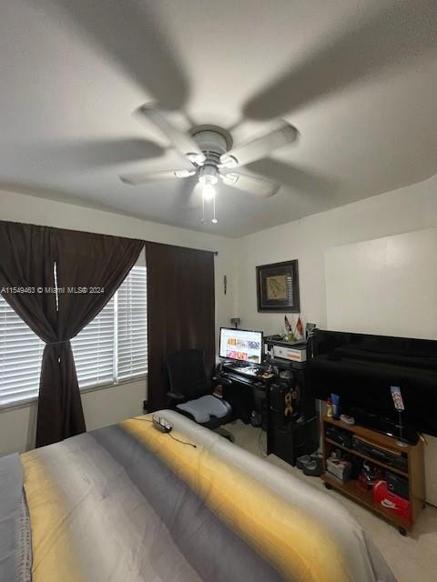 bedroom with carpet flooring and ceiling fan