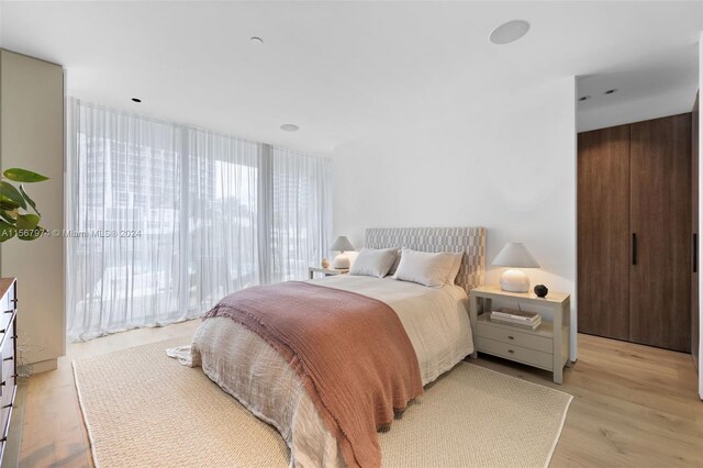 bedroom featuring light wood-type flooring