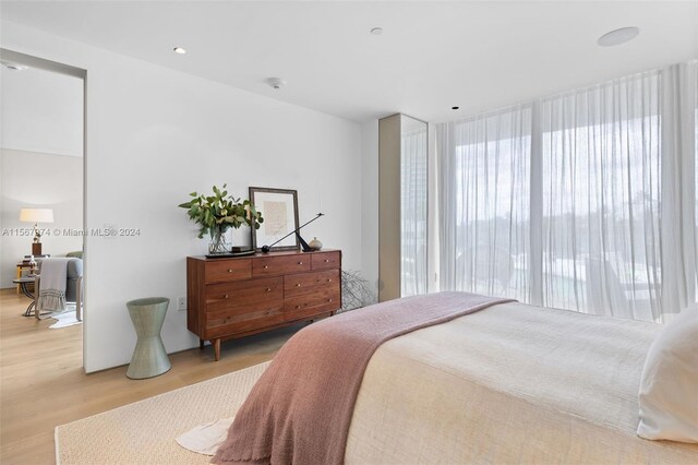 bedroom featuring light hardwood / wood-style floors