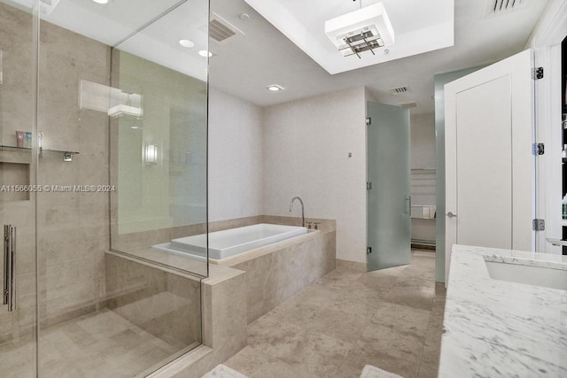 bathroom with independent shower and bath and tile flooring