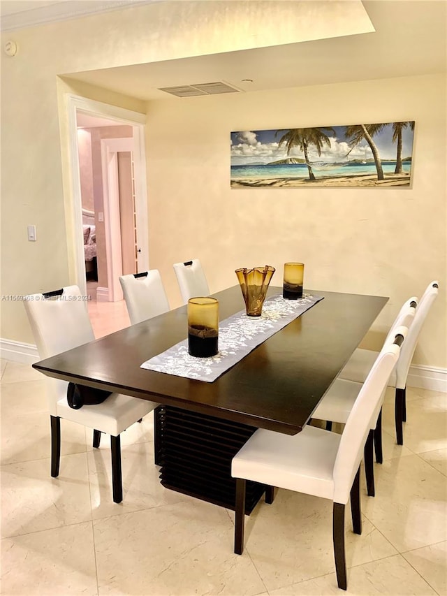 dining room with light tile flooring