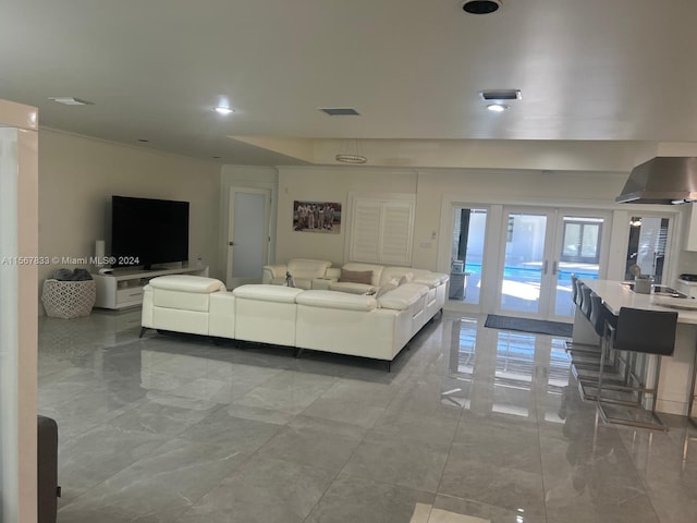 living room with light tile flooring