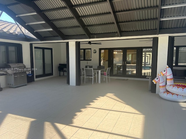 view of patio with french doors, ceiling fan, and area for grilling