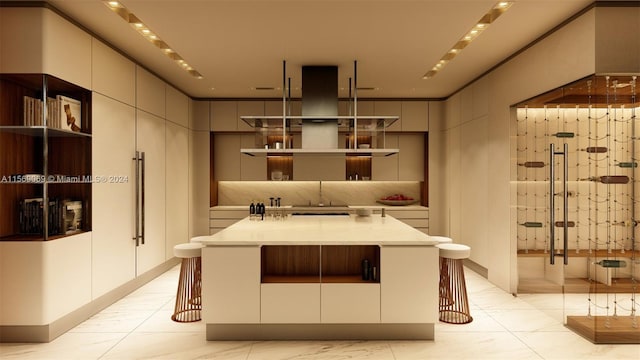 kitchen with a center island and light tile floors