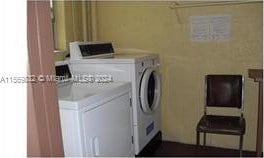 laundry area with washer and dryer