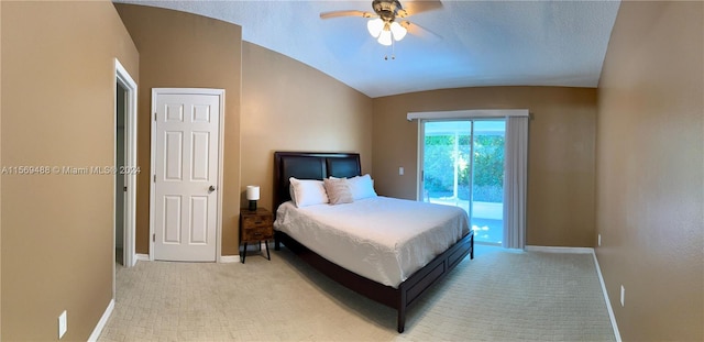 bedroom featuring light colored carpet, lofted ceiling, ceiling fan, and access to exterior